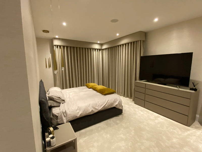 Silent Gliss AutoGlide Motorised 80mm Wave Curtain Track & Hand made Wave Curtain and Voiles were used for this Stunning Penthouse Bedroom